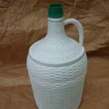 Bonbonne 4L verte entourée de plastique blanc