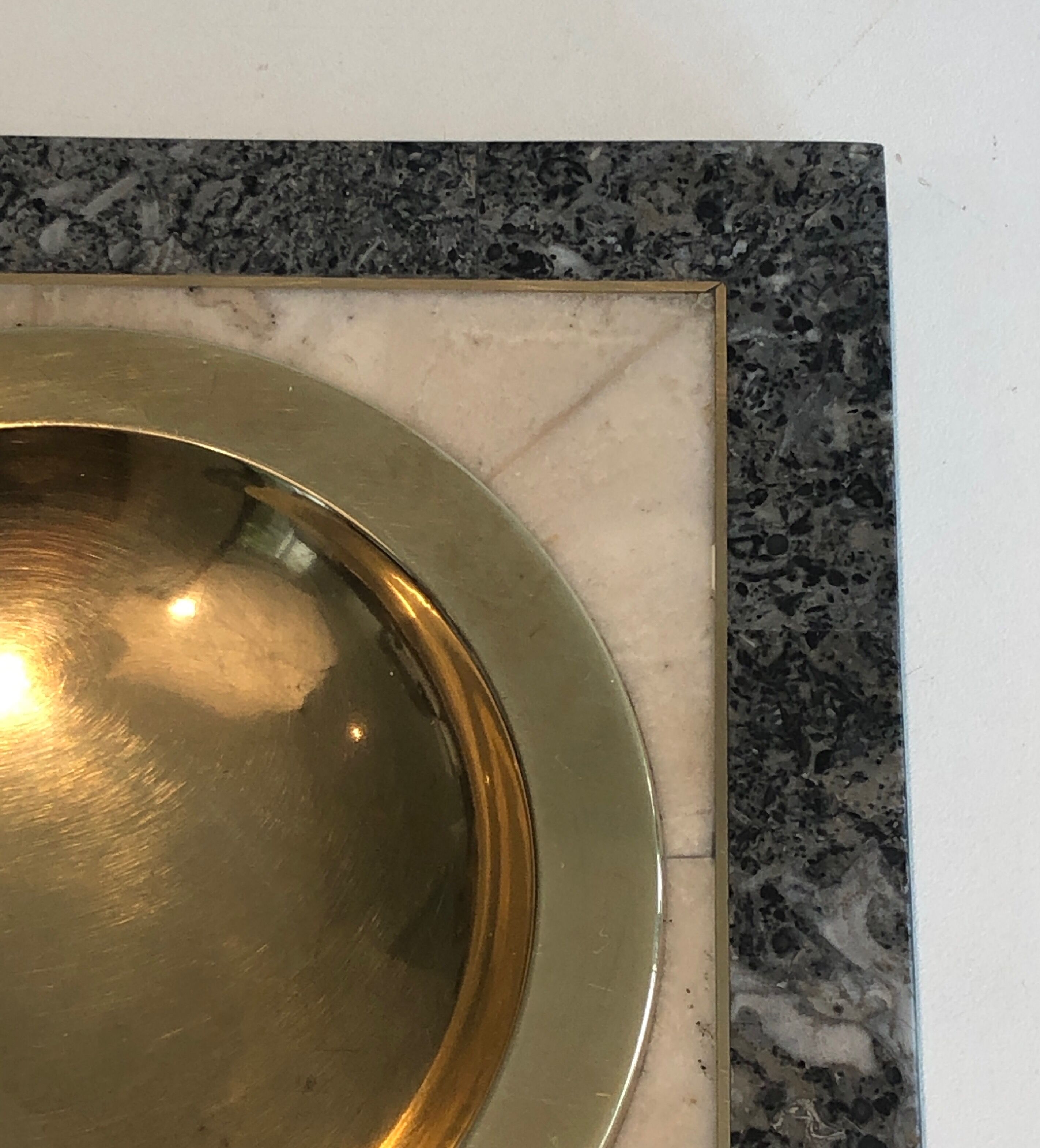 Neoclassical style pocket empty in faux-marble and brass. french work. around 1970