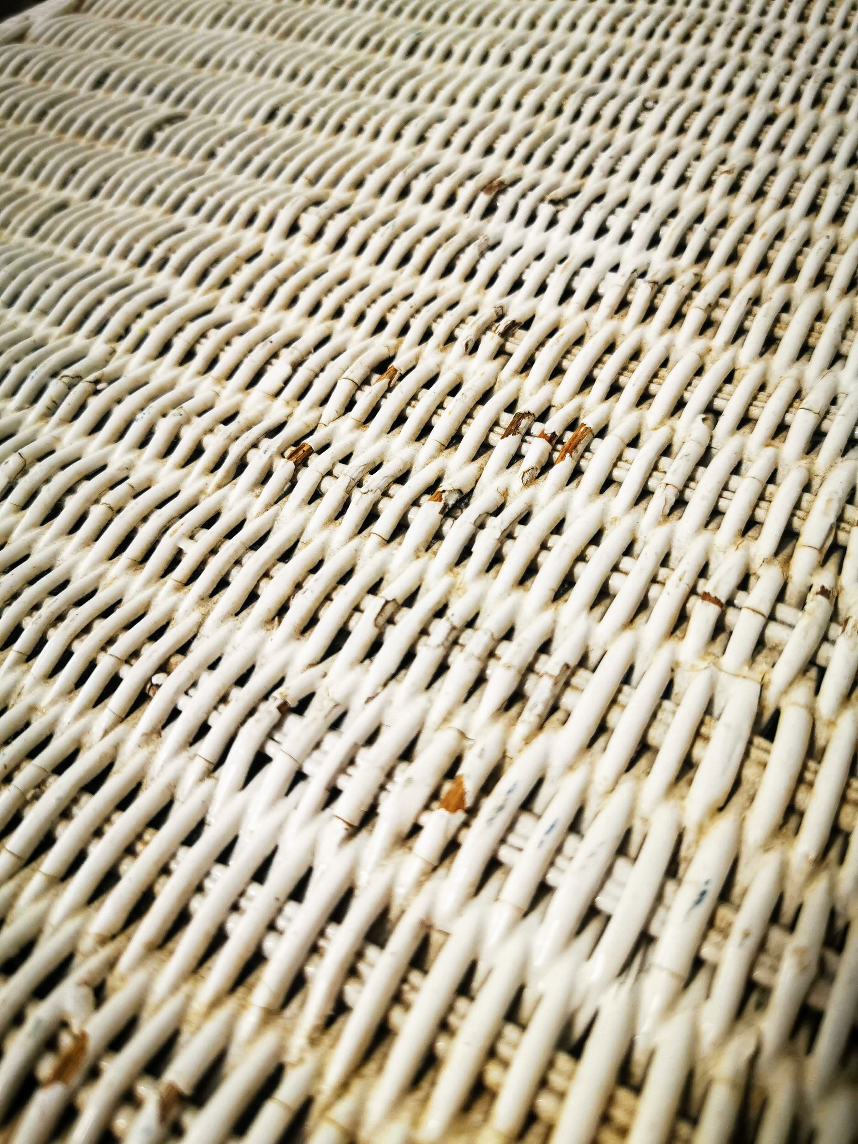 White rattan side table