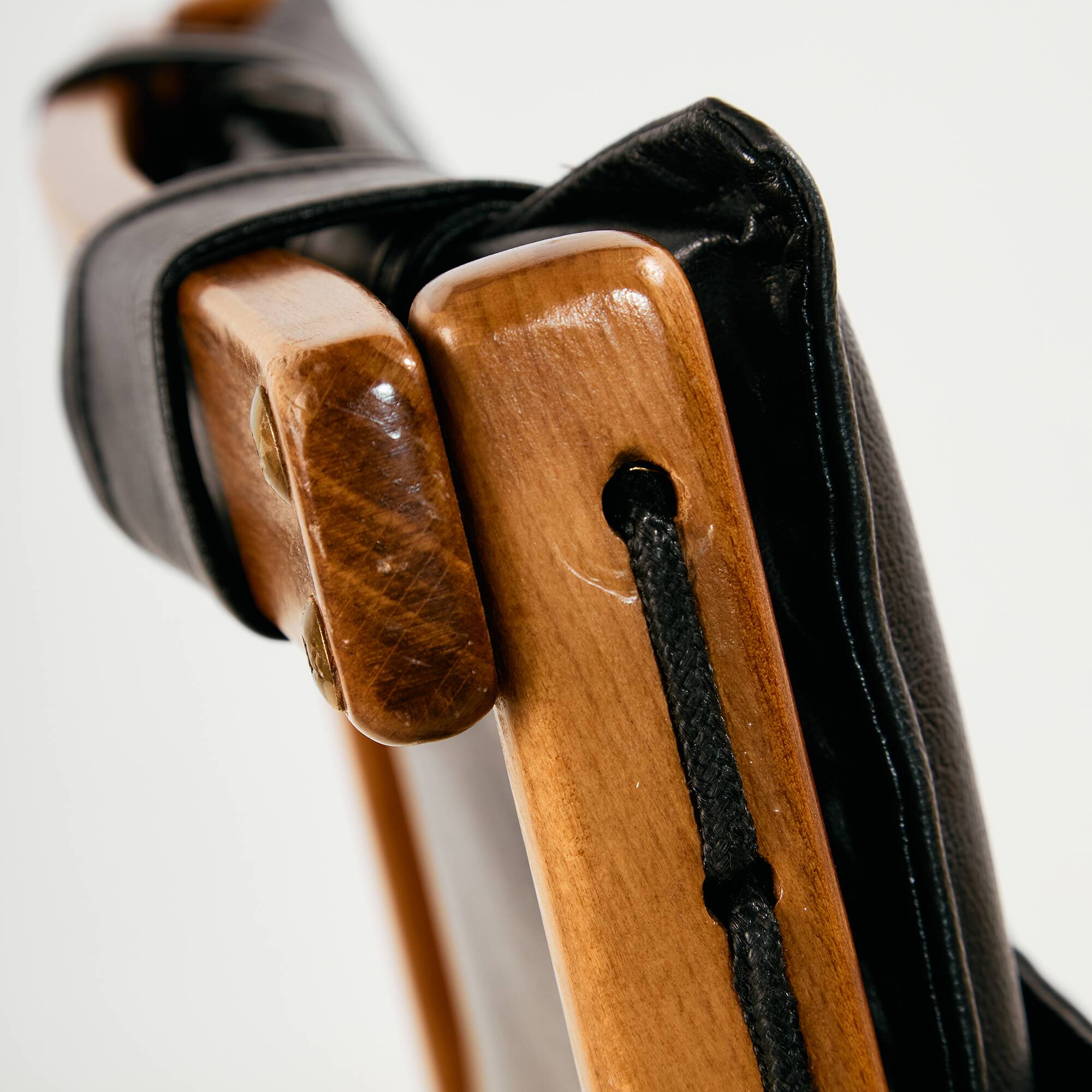 Beech armchair with leather upholstery