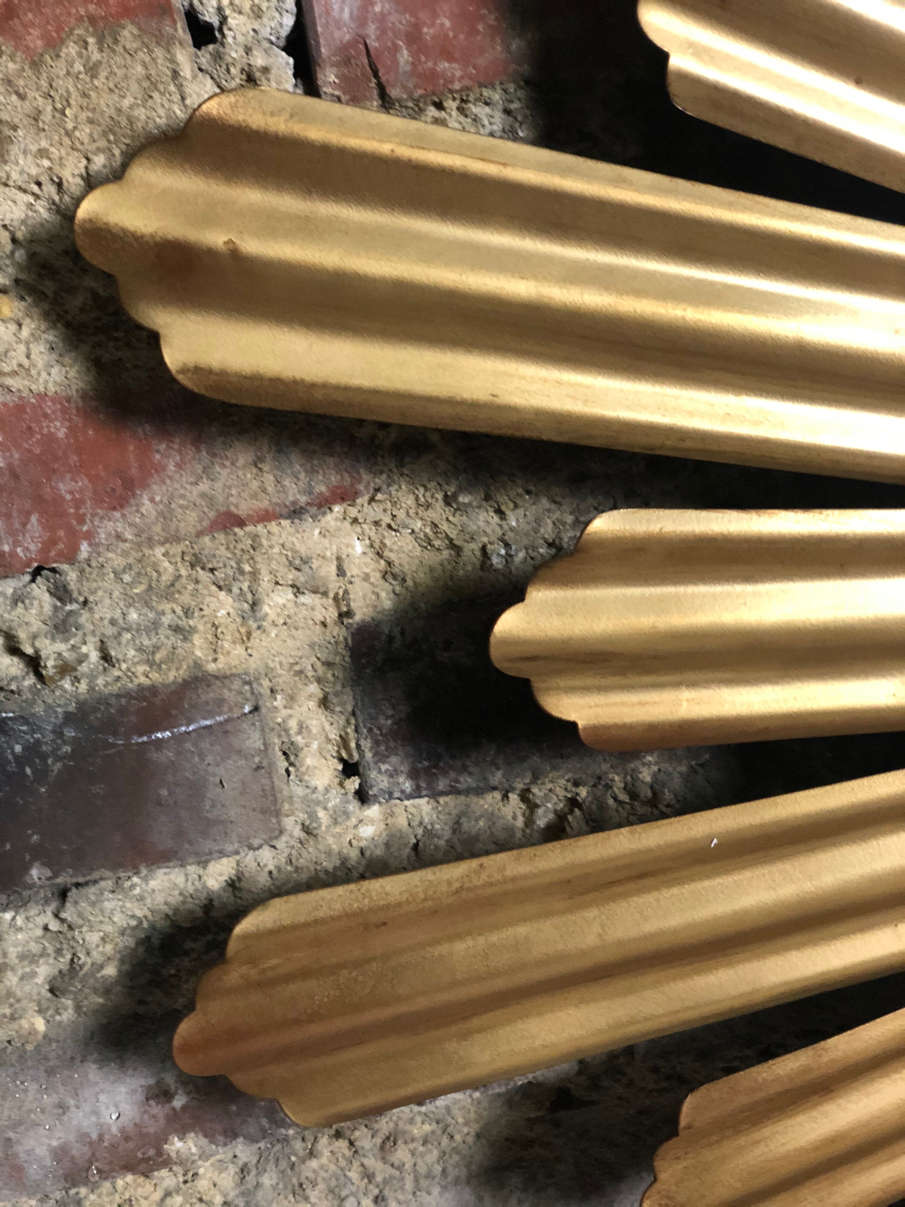 Sun mirror "André" in gilded sheet metal witch eye