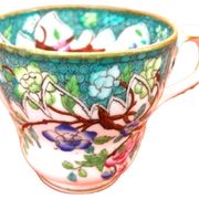 Antique porcelain cup in the Minton style with Japanese decoration.
