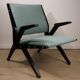 Fauteuil vintage années 60 en bois noir et tissu