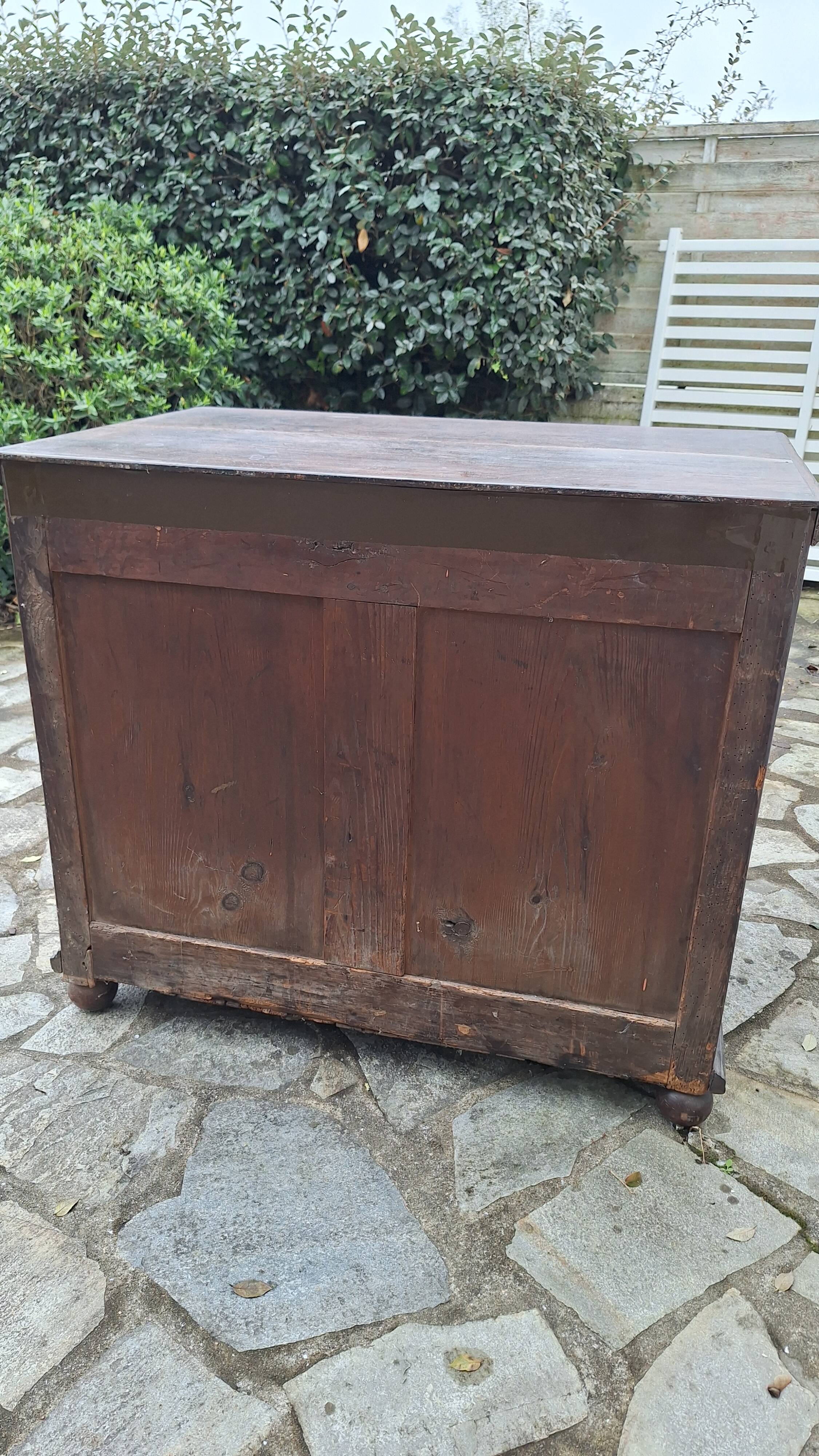 Jacobean style wooden chest of drawers