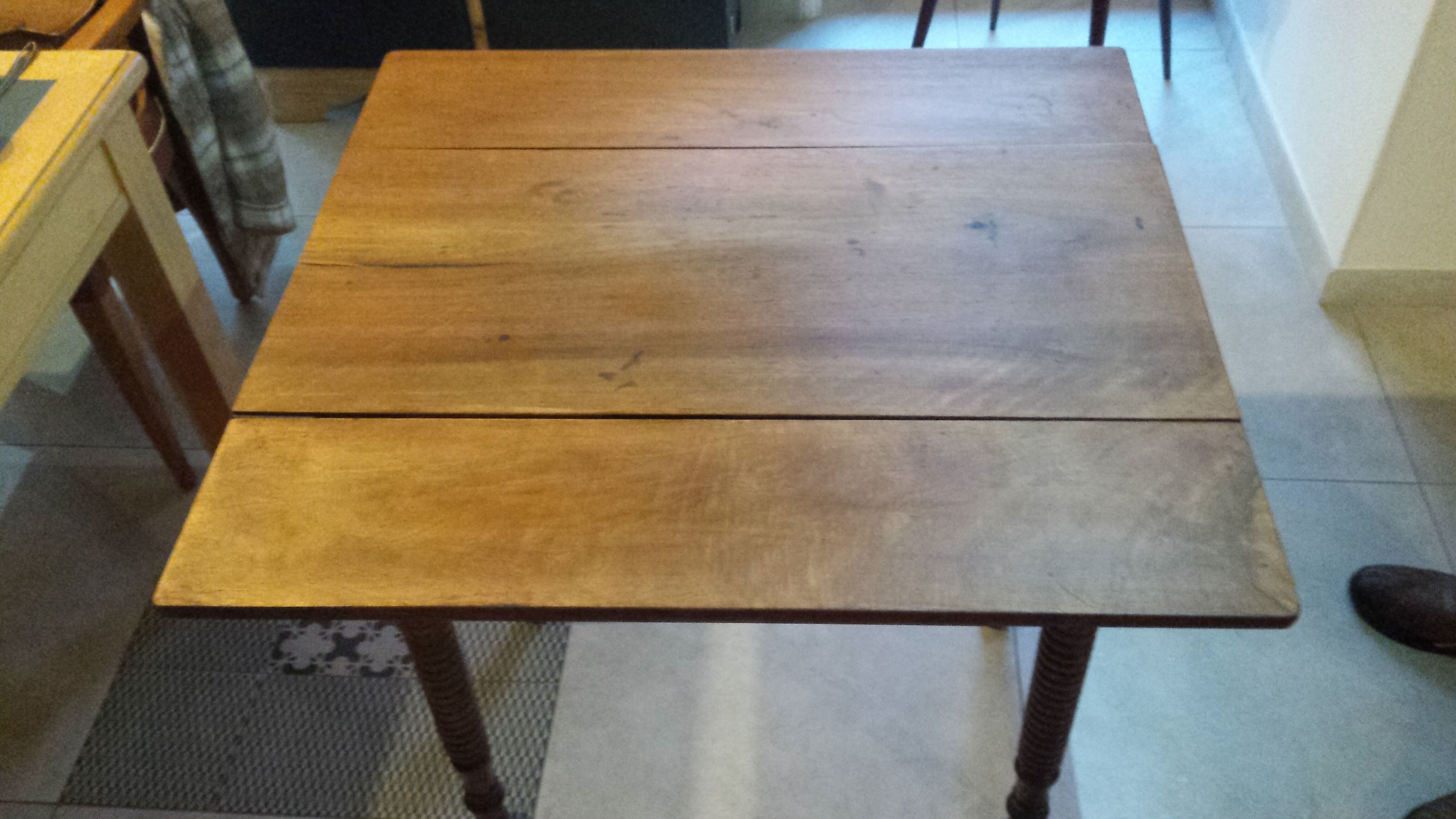 Wooden table with extensions