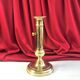 Gilded copper push candle holder