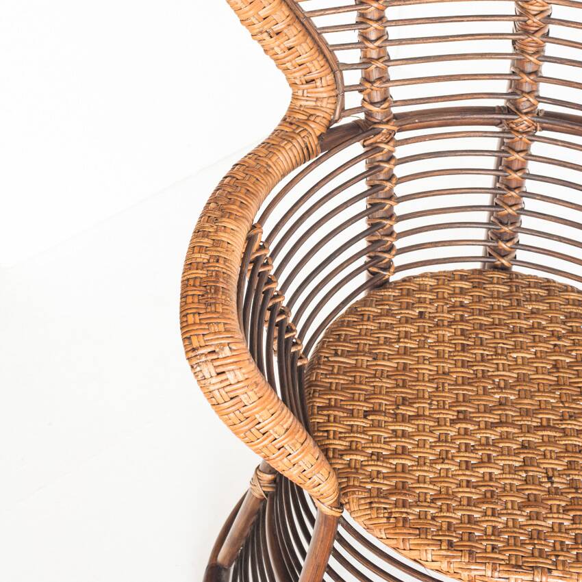 Vintage high armchair in cane/rattan. France, 1960s