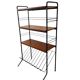 Vintage black shelf/coat rack with wooden accents.