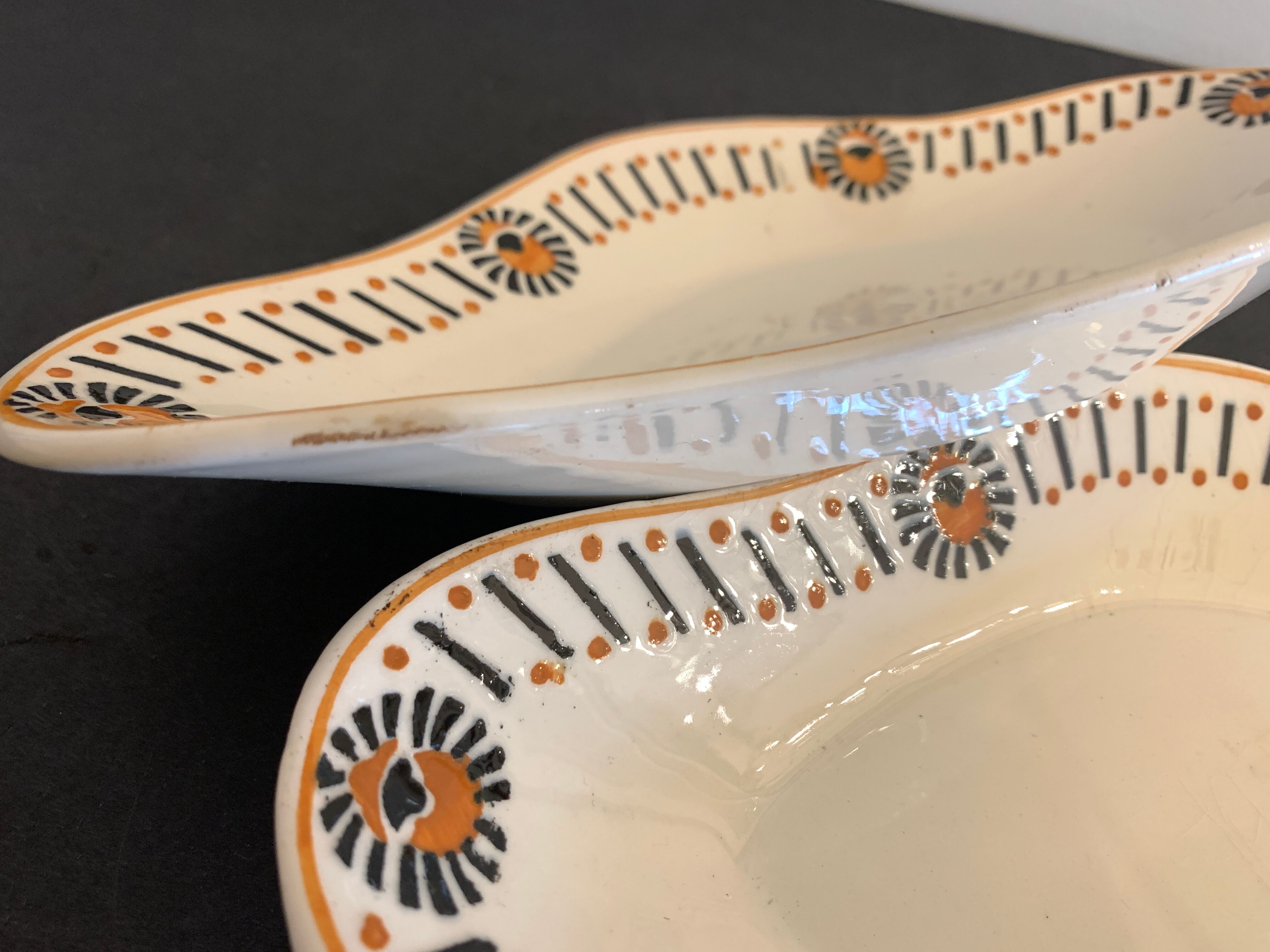 Pair of art deco raviers signed Longwy and numbered, model Gerazine