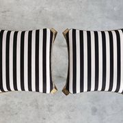 Pair of Mid Century Modern ottomans by Pier Luigi Colli from the 1950s.