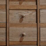 Solid oak dressmaker's cabinet with 13 drawers and 1 door