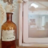 Medicine cabinet in patinated pink wood