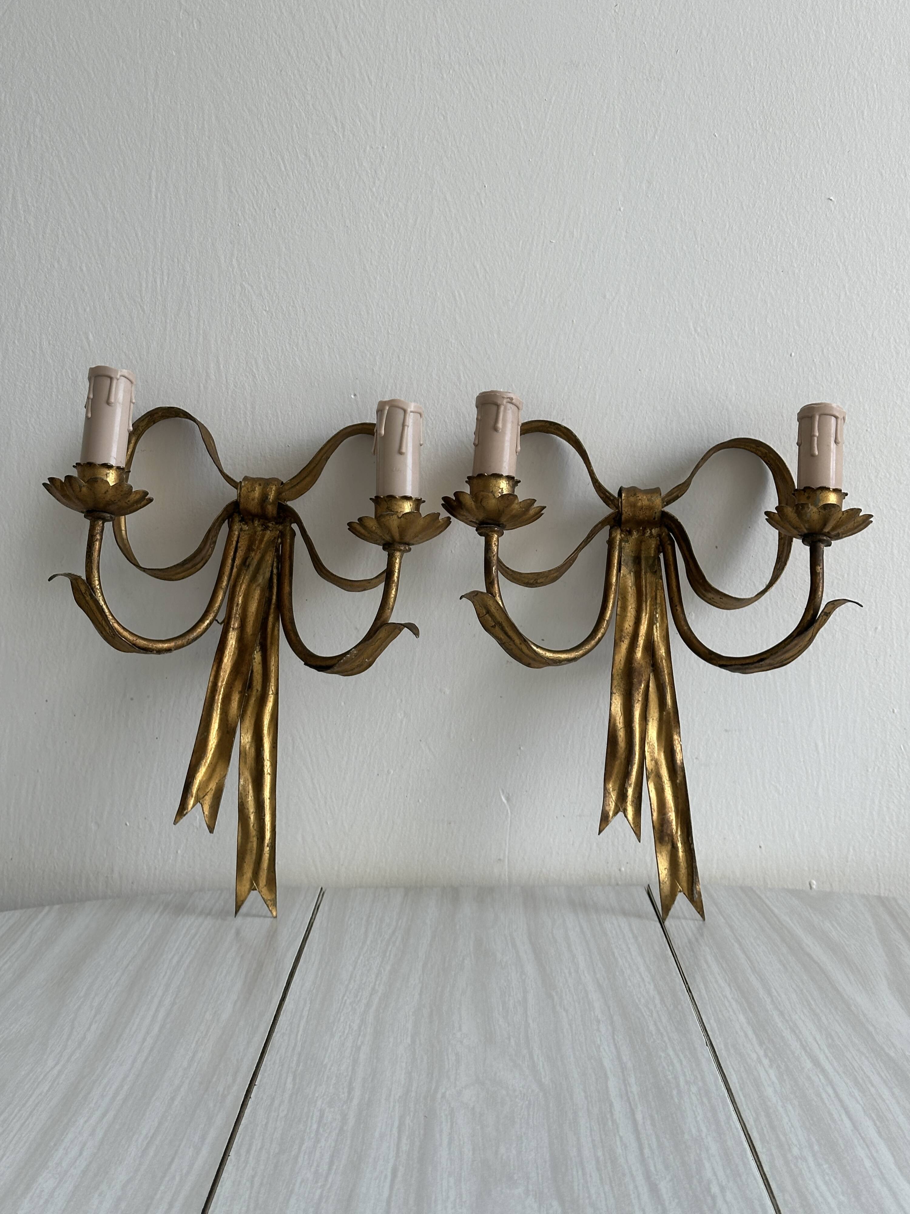 pair of antique metal wall lights