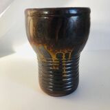 Metallic brown ceramic torso vase