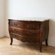 Curved Regency-style commode in mahogany marquetry.