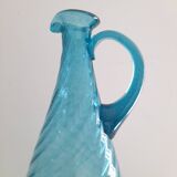 Tall twisted blue glass carafe