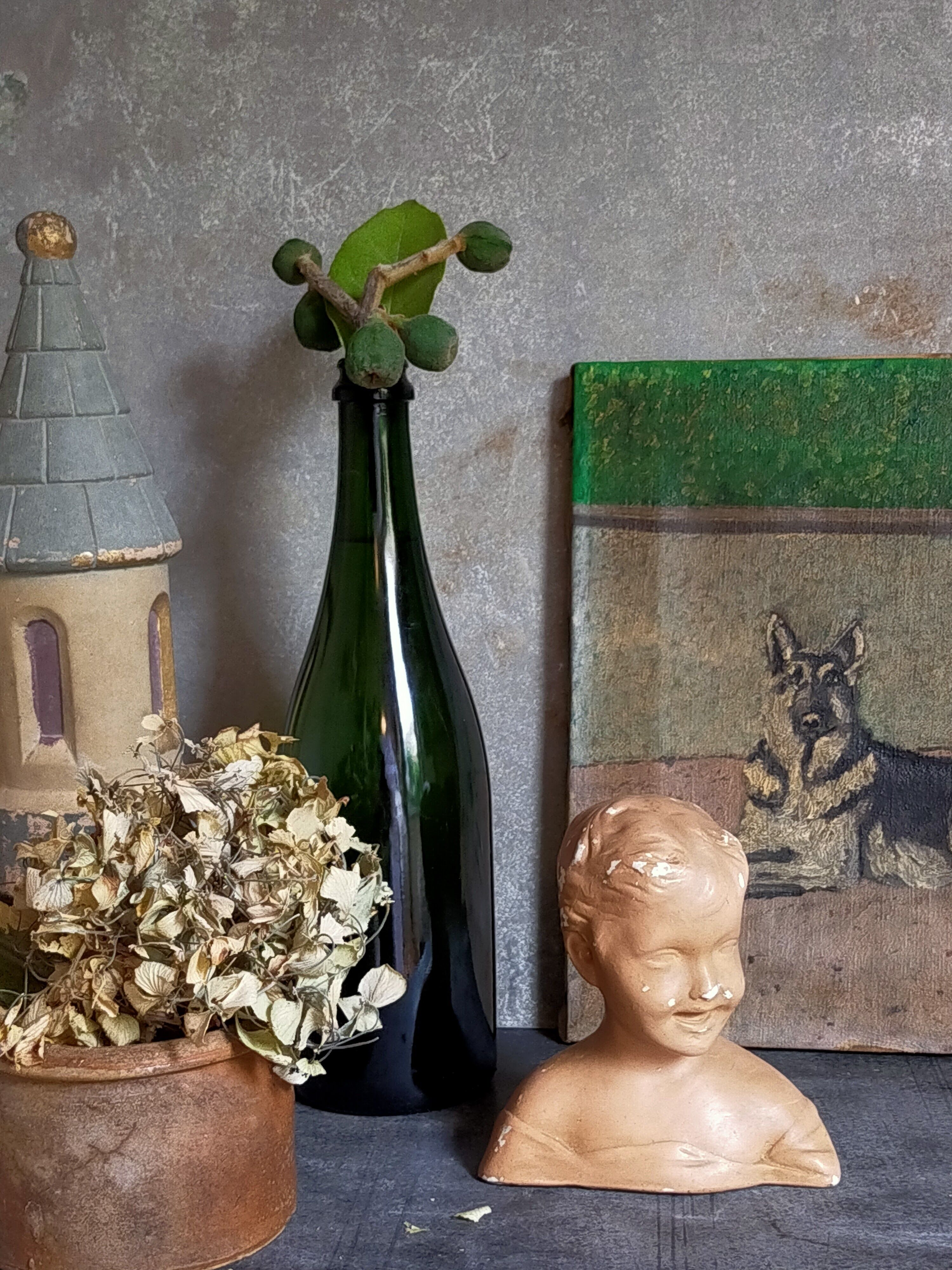 Bust of a small child in ancient plaster