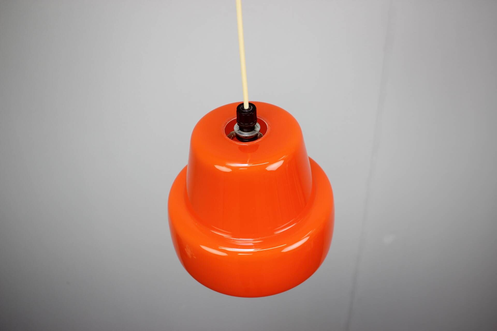Vintage orange glass pendant lamp, Czechoslovakia, circa 1970.