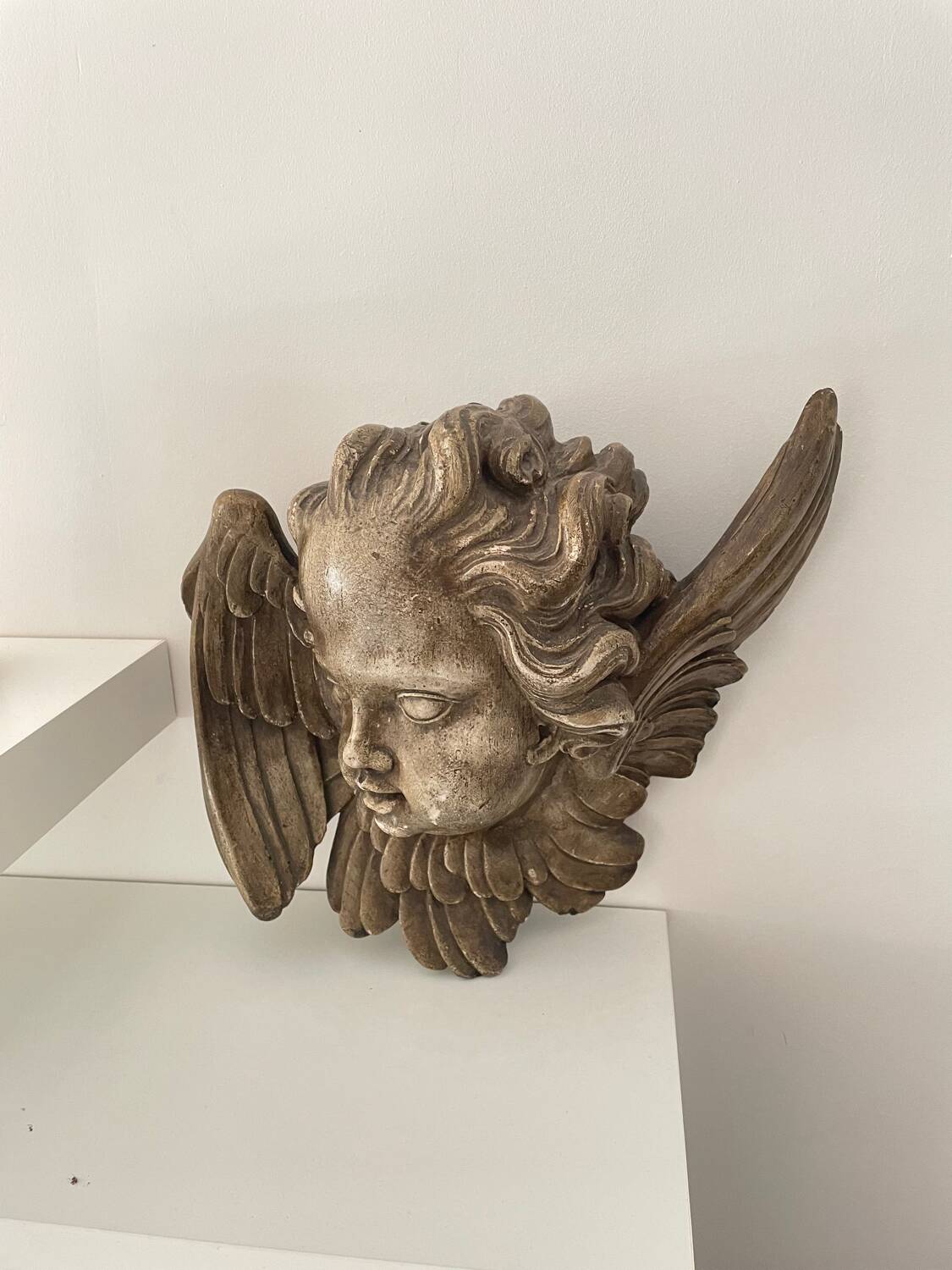 Old plaster angel head