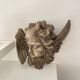 Old plaster angel head