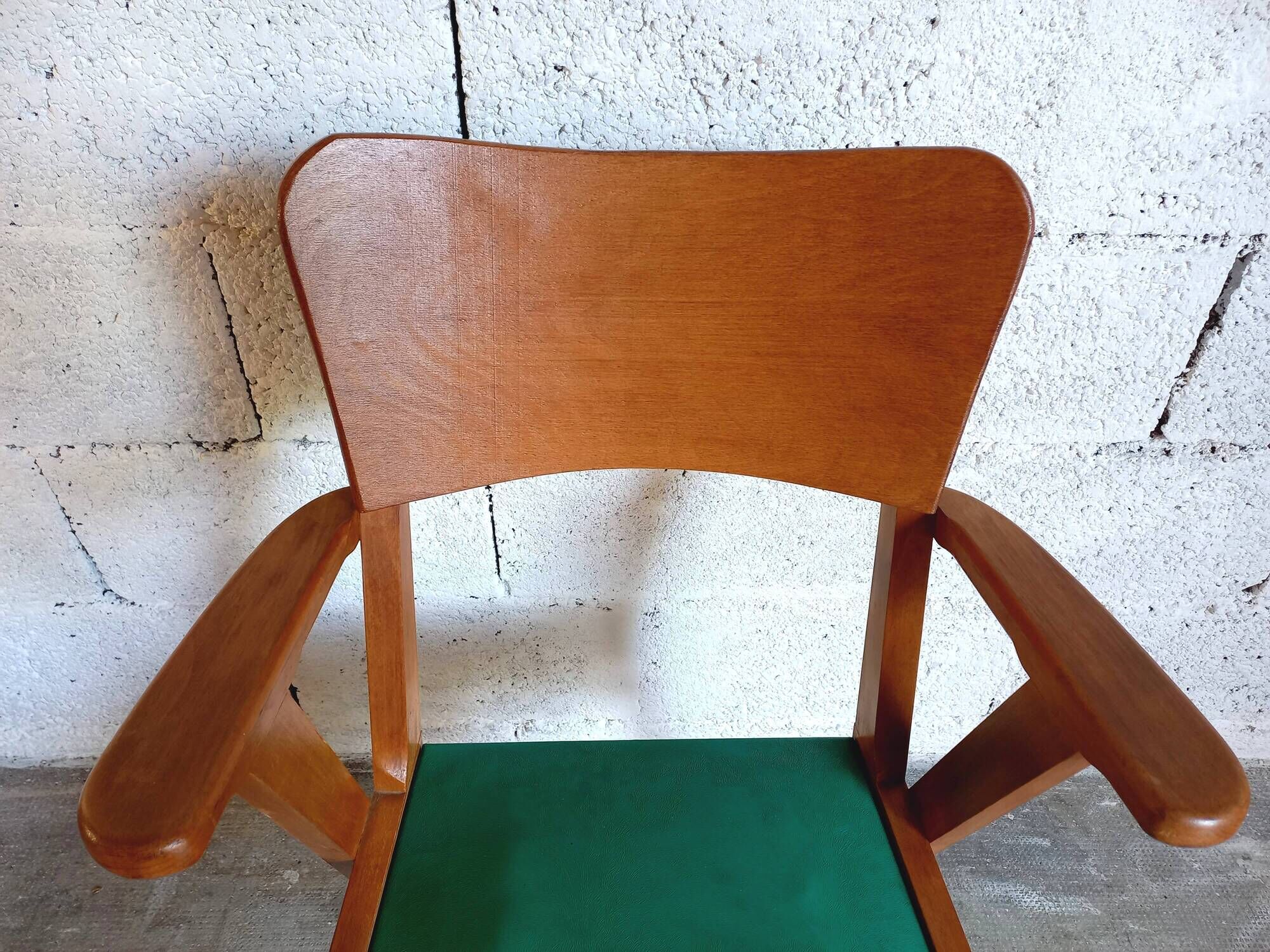 Vintage armchair in skai and wood 60s
