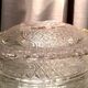 Butter dish or candy dish in pressed glass molded with golden rim
