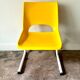 Children's chair in white metal and yellow plastic