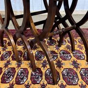 Set of English nesting tables in mahogany from the 1950s.