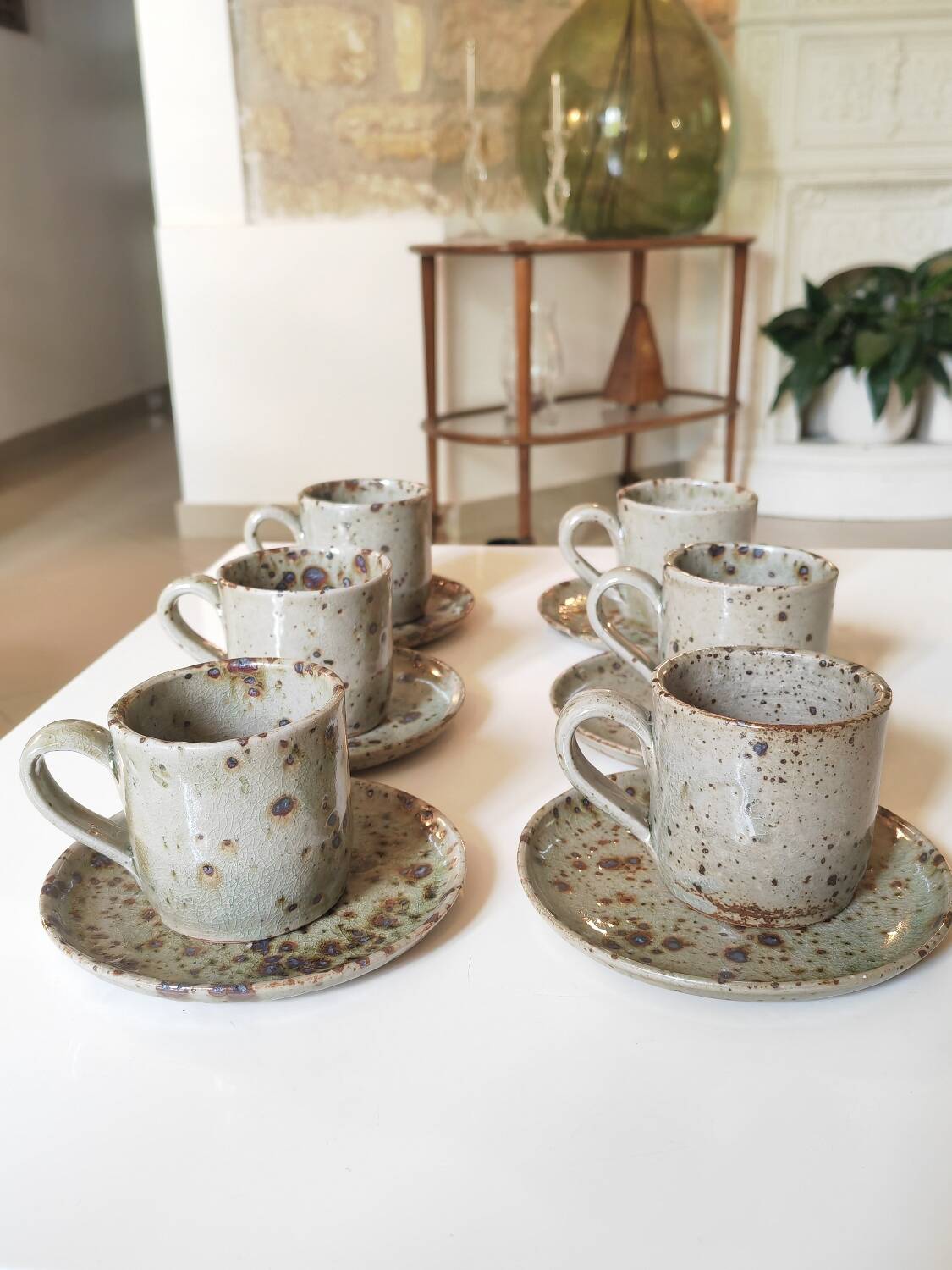 Series of stoneware cups and saucers