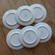 6 vintage dessert plates stamped Longchamp with floral border