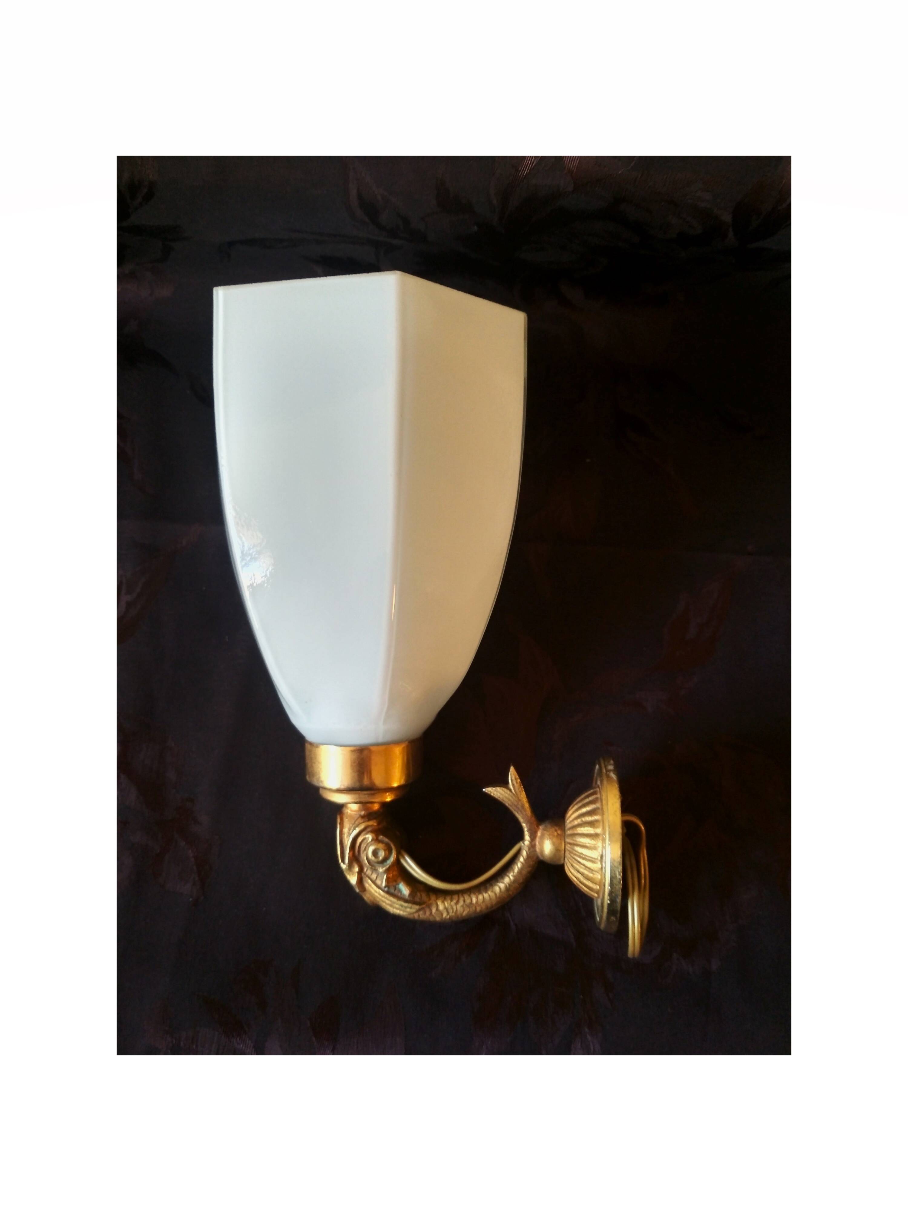 Golden brass wall light with glass tulip - dolphin pattern bathroom lamp