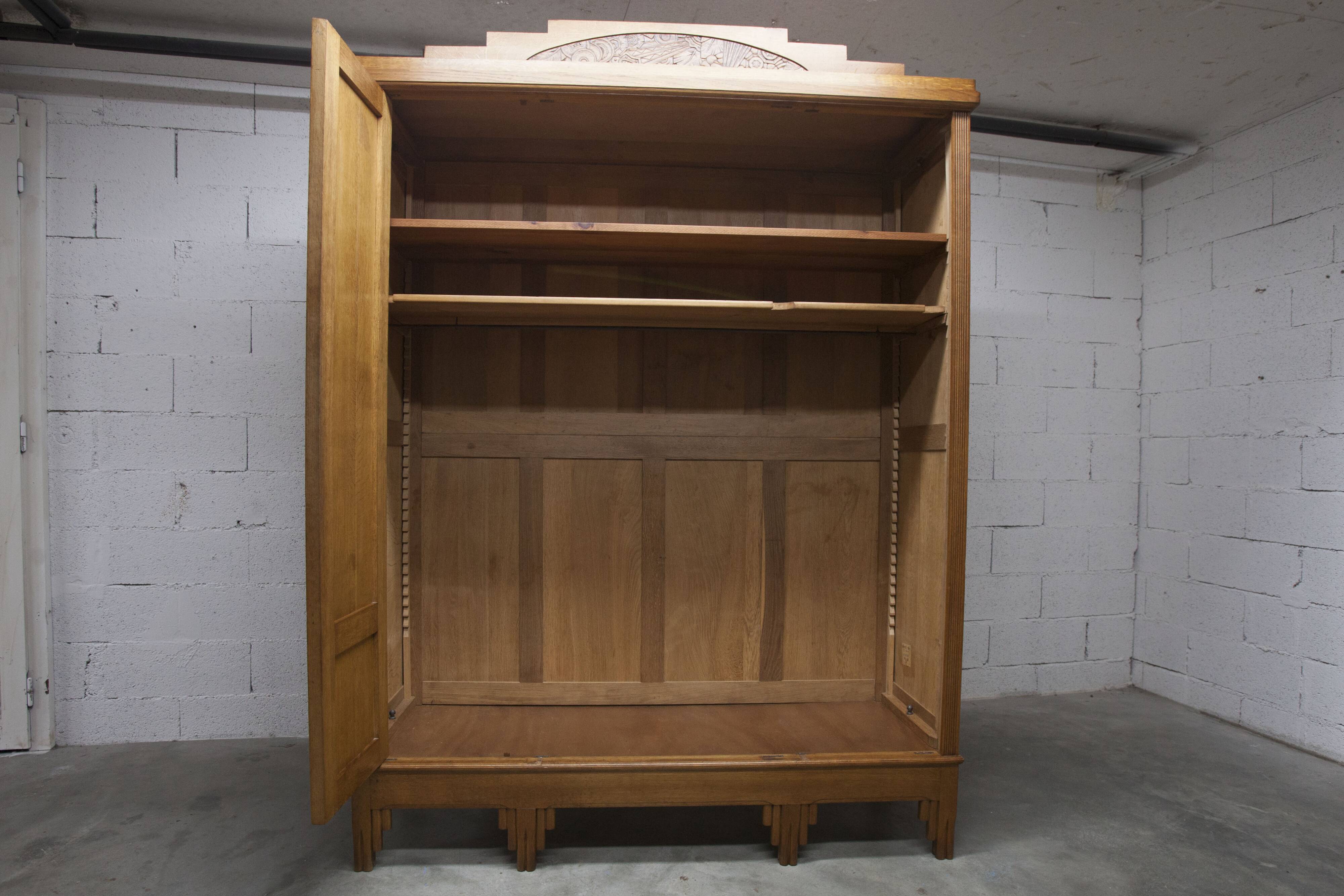 Art Deco carved oak wardrobe - Flemish workshop circa 1930
