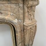 Cheminée de style Louis XV en marbre de breche rouge XIX siècle