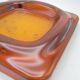 Empty-pocket in amber glass