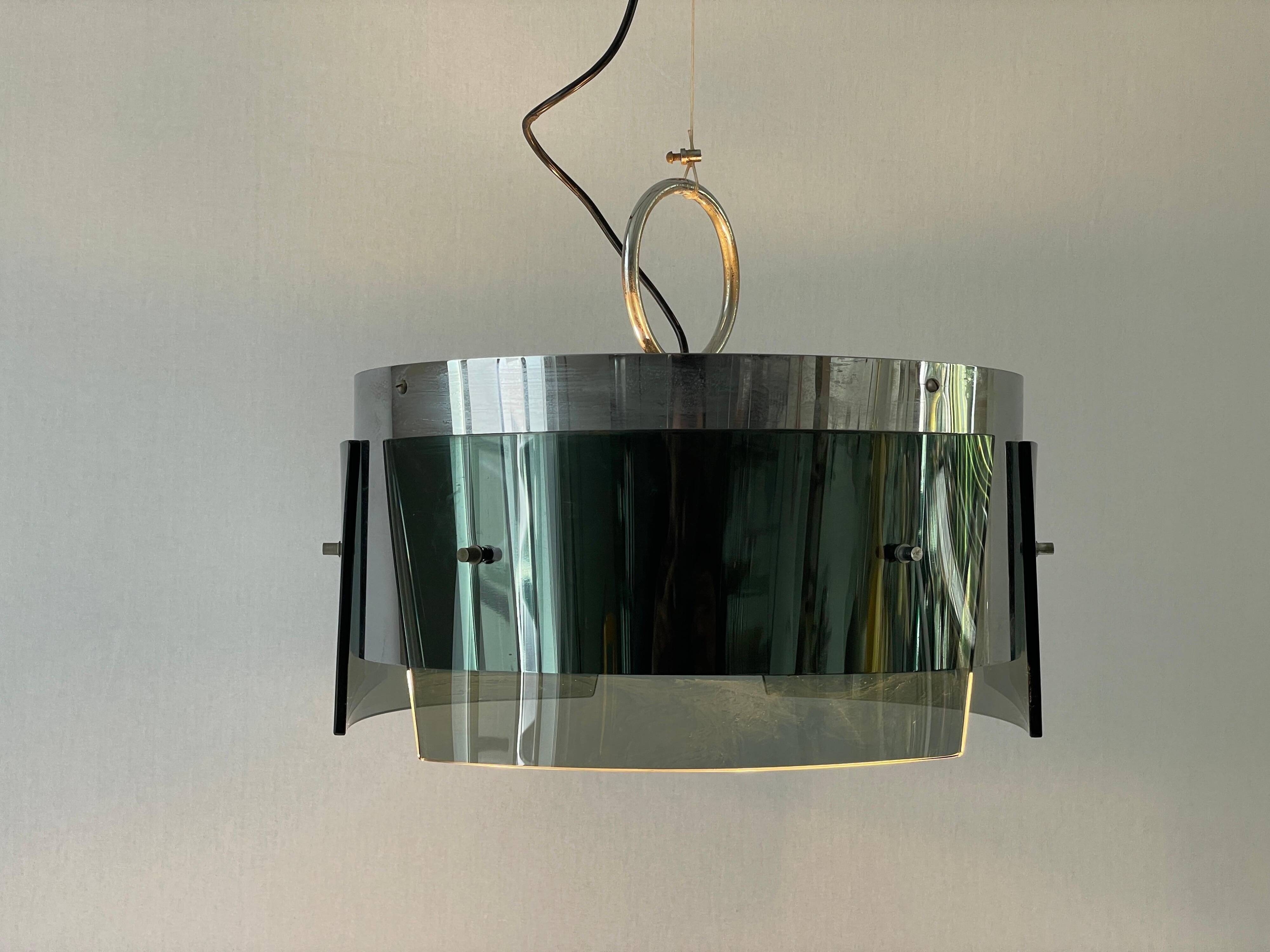 Suspended lamp in green glass and chrome, 1960s, Italy