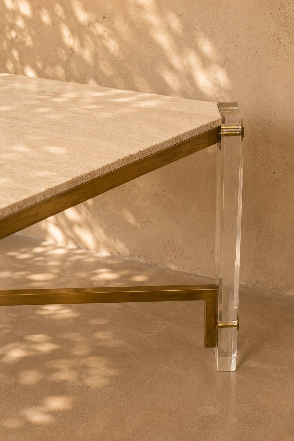 1970s dining table in travertine, gold metal and plexiglass.