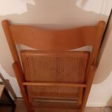 Folding chair in cannage