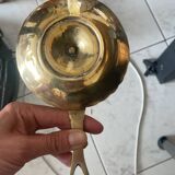 Brass hand candle holder with Egyptian decorations