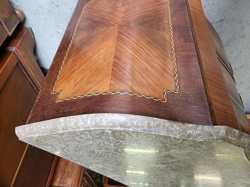 Curved chest of drawers in rosewood and marble marquetry