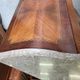 Curved chest of drawers in rosewood and marble marquetry