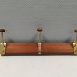 Danish teak and brass coat rack with adjustable hooks, 1960s.