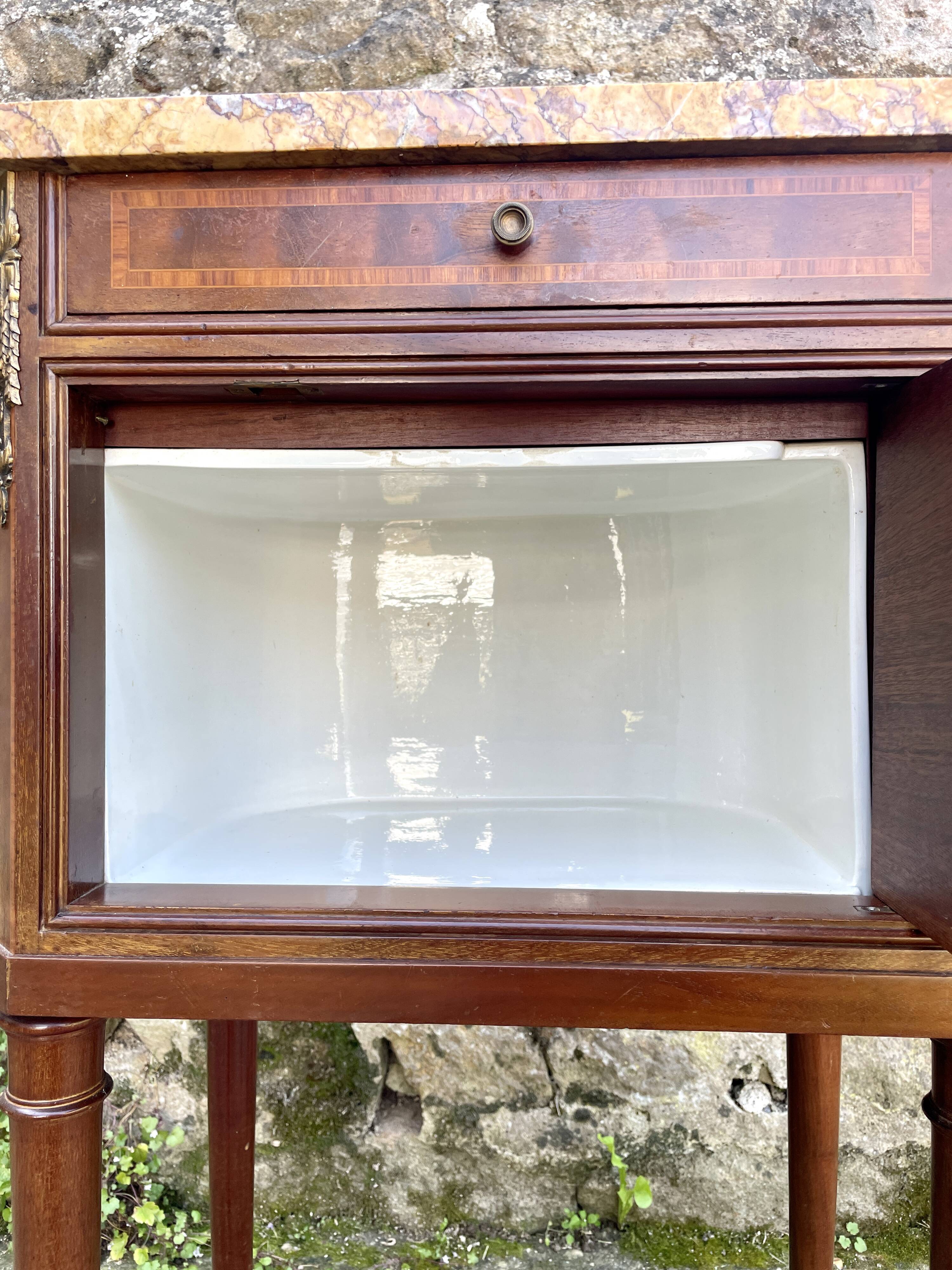 Louis XVI style bedside table in bronze, marble and ceramic
