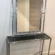 Console and chrome faux-bamboo mirror