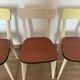 4 wooden chairs and formica kitchen