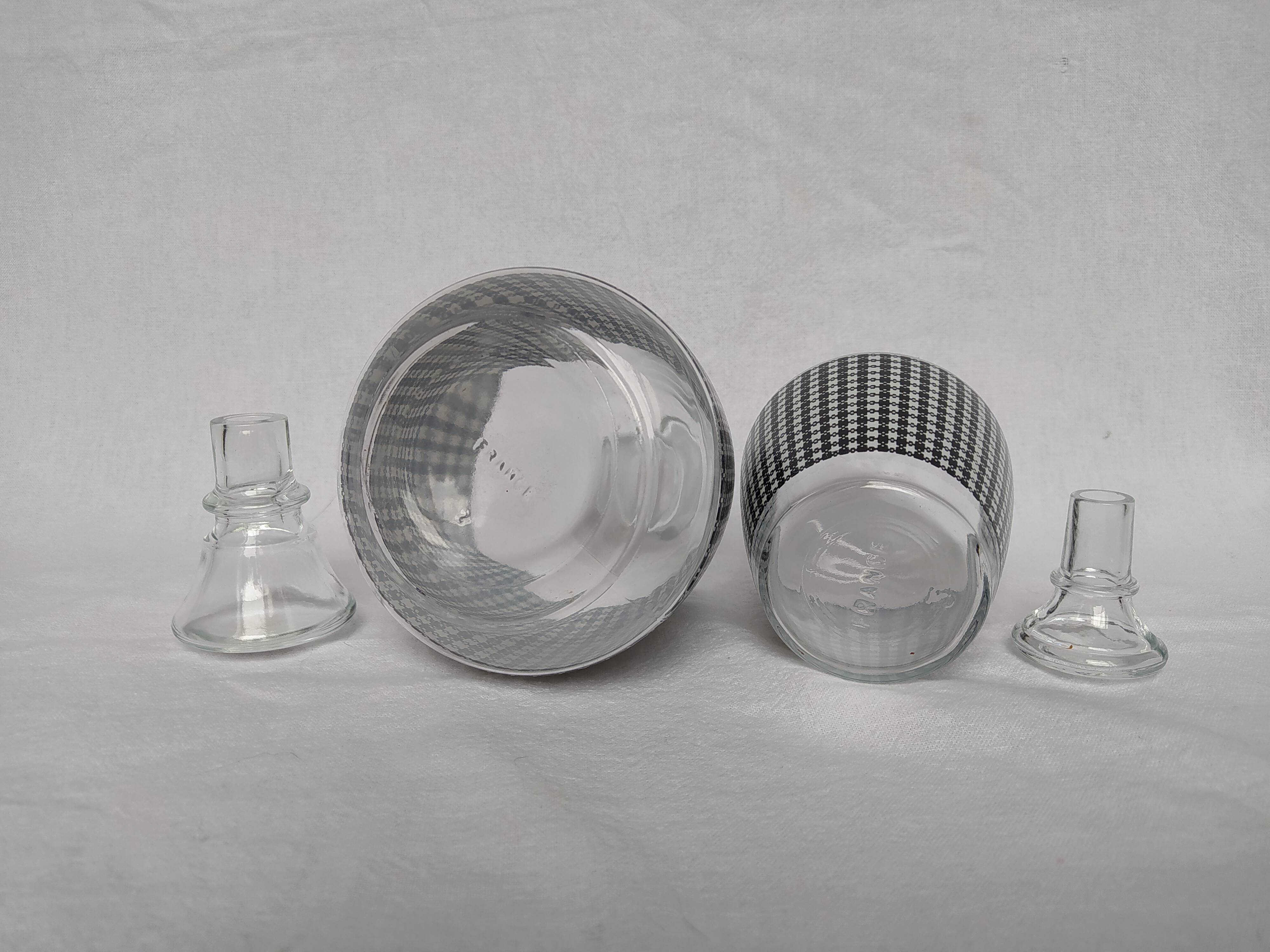 Set of 2 black and white houndstooth glass carafes from the Arques crystal factory. Rare.