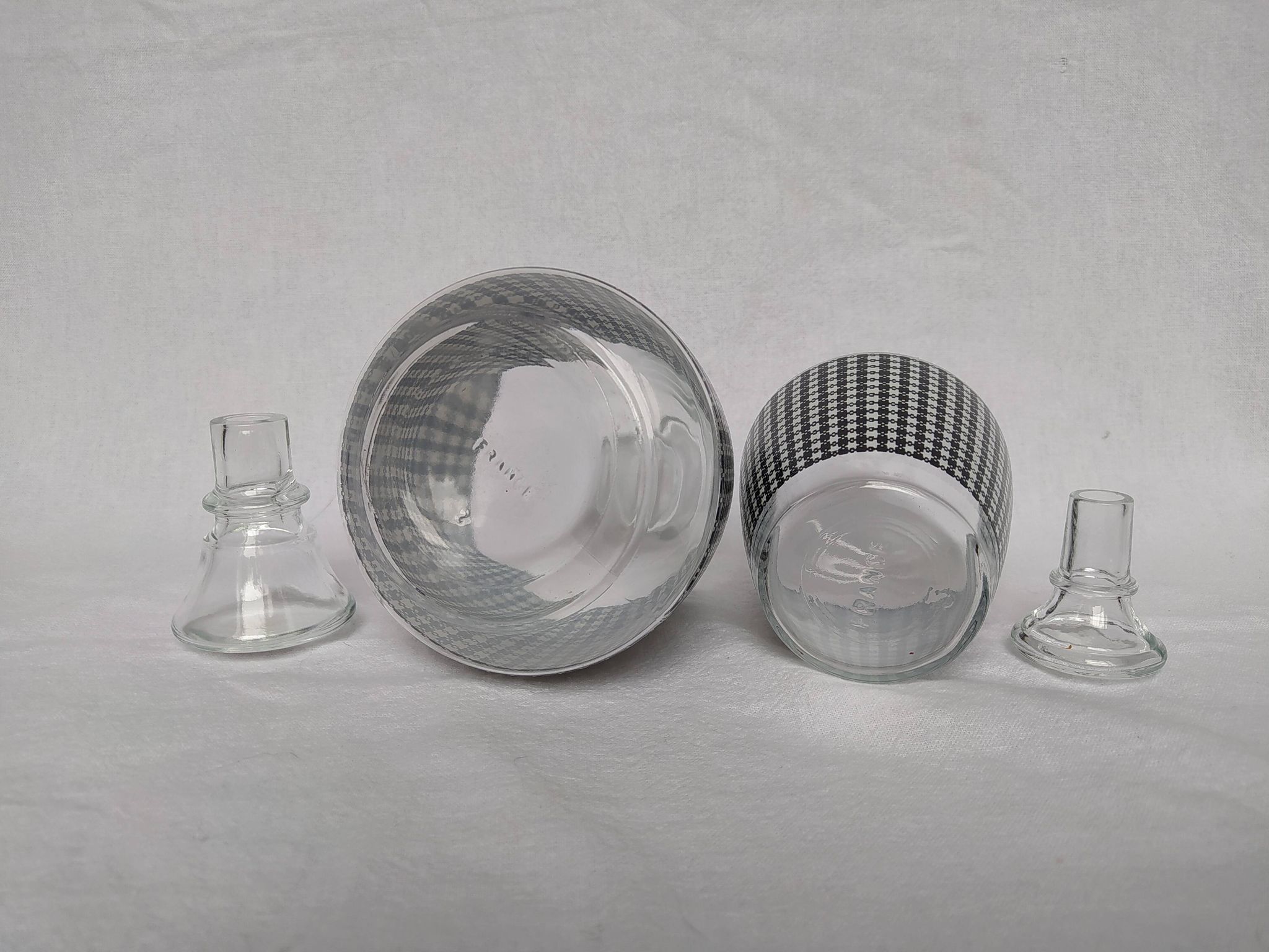 Set of 2 black and white houndstooth glass carafes from the Arques crystal factory. Rare.