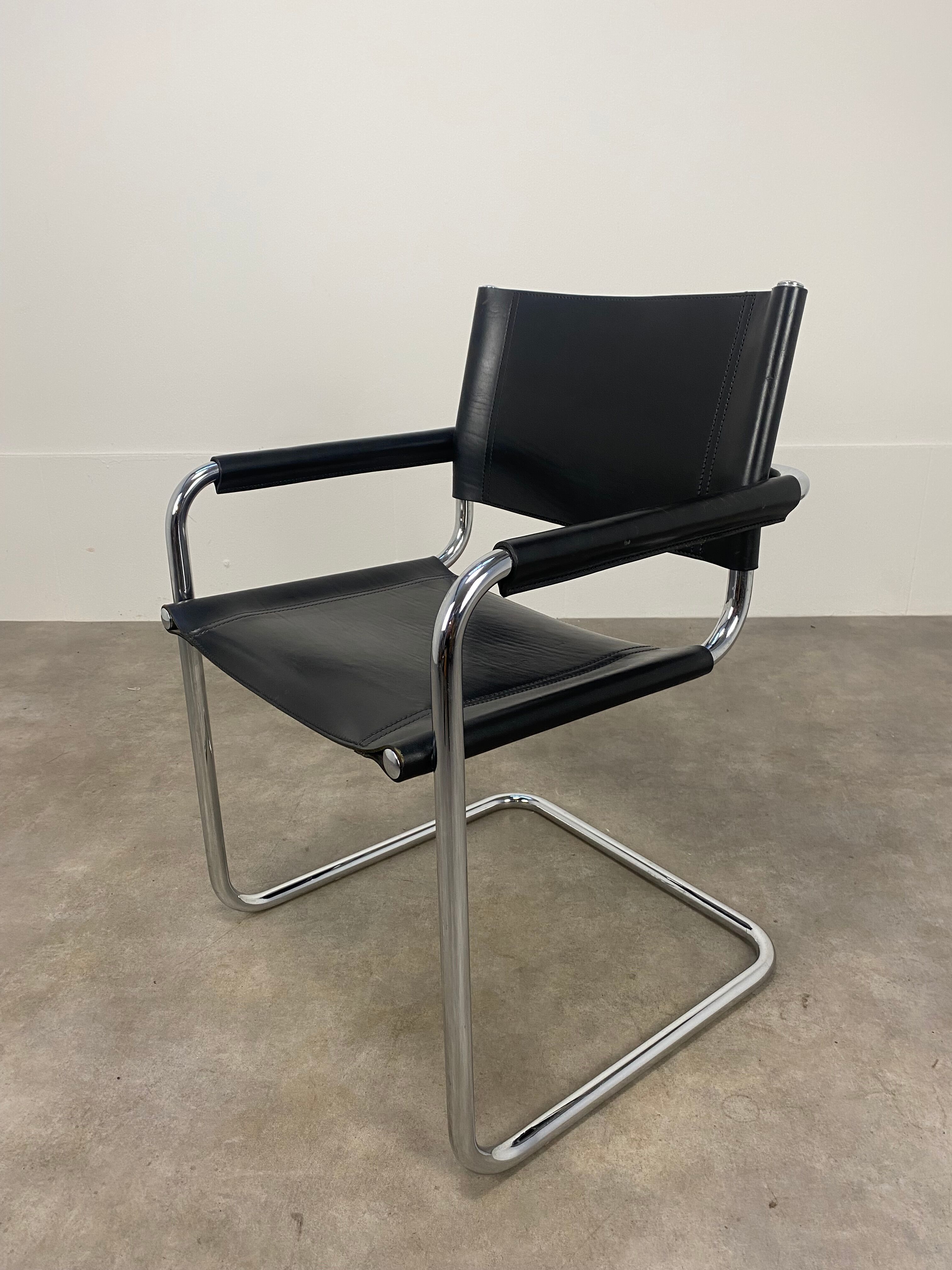 Black and chrome leather cantilever armchair