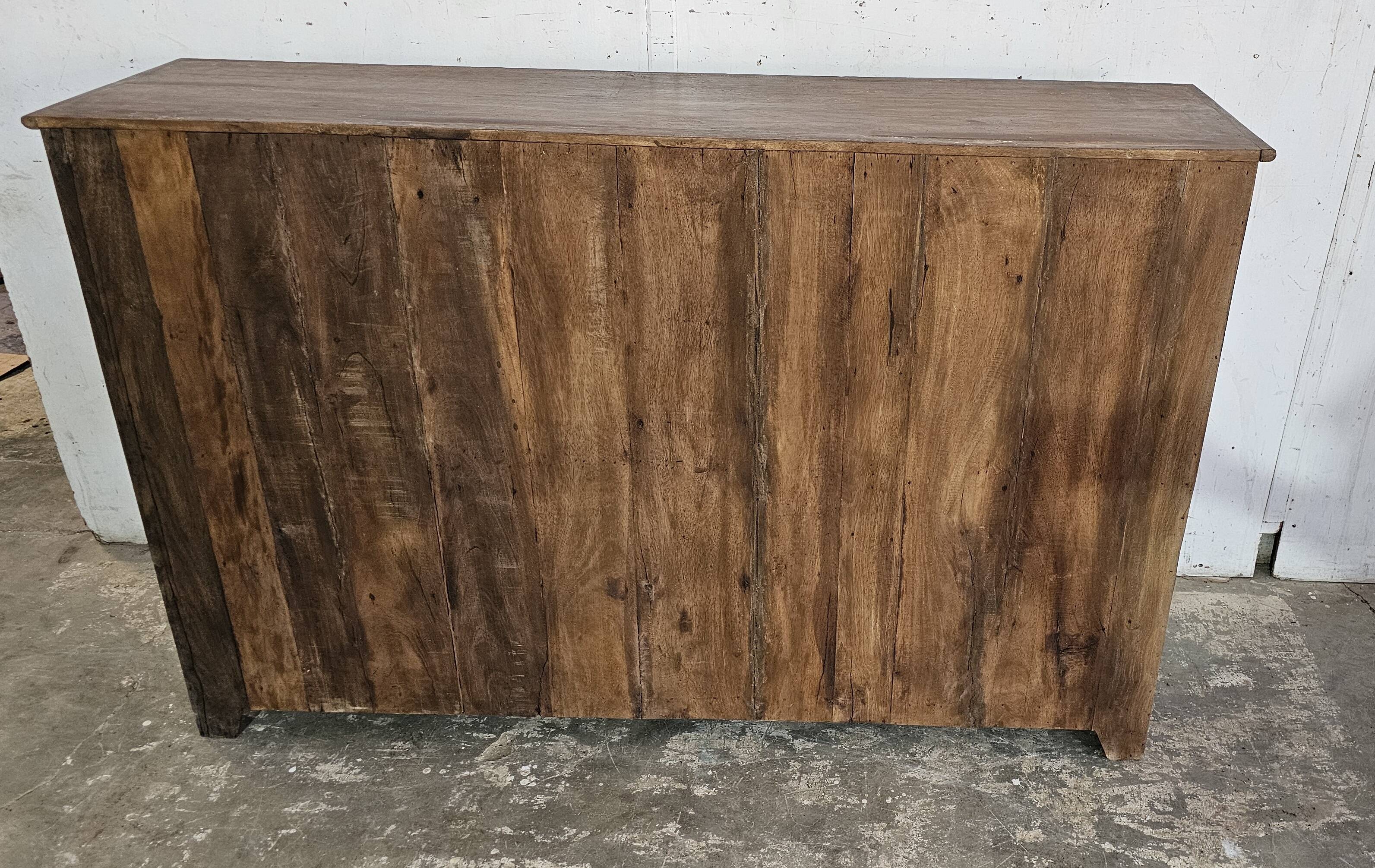 Antique glass-fronted buffet in Burmese teak