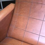 Fauteuil en skai marron
