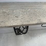 Art Deco console in hammered wrought iron, 20th century.